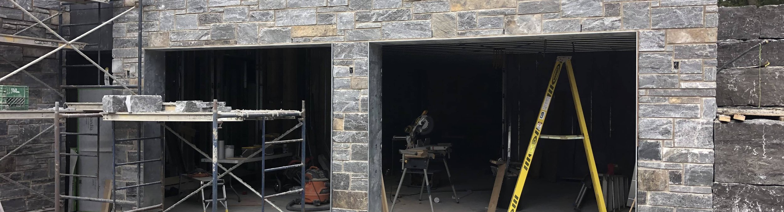 natural stone facade on a garage door