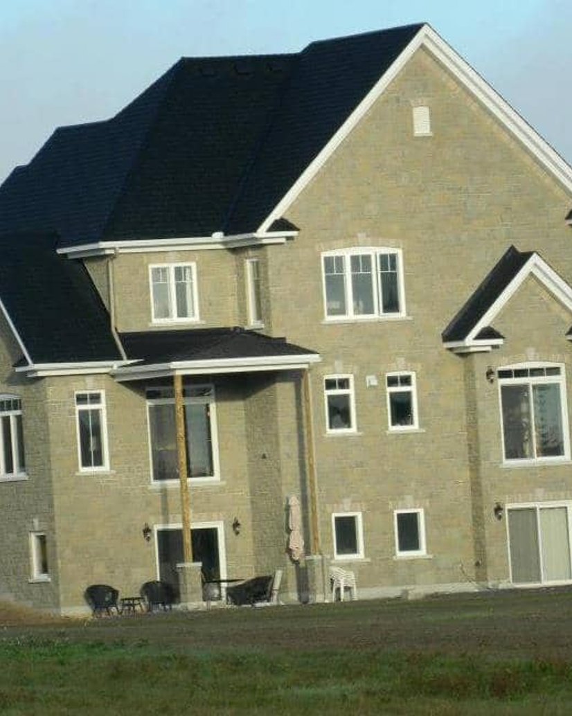 natural stone wraped around the house