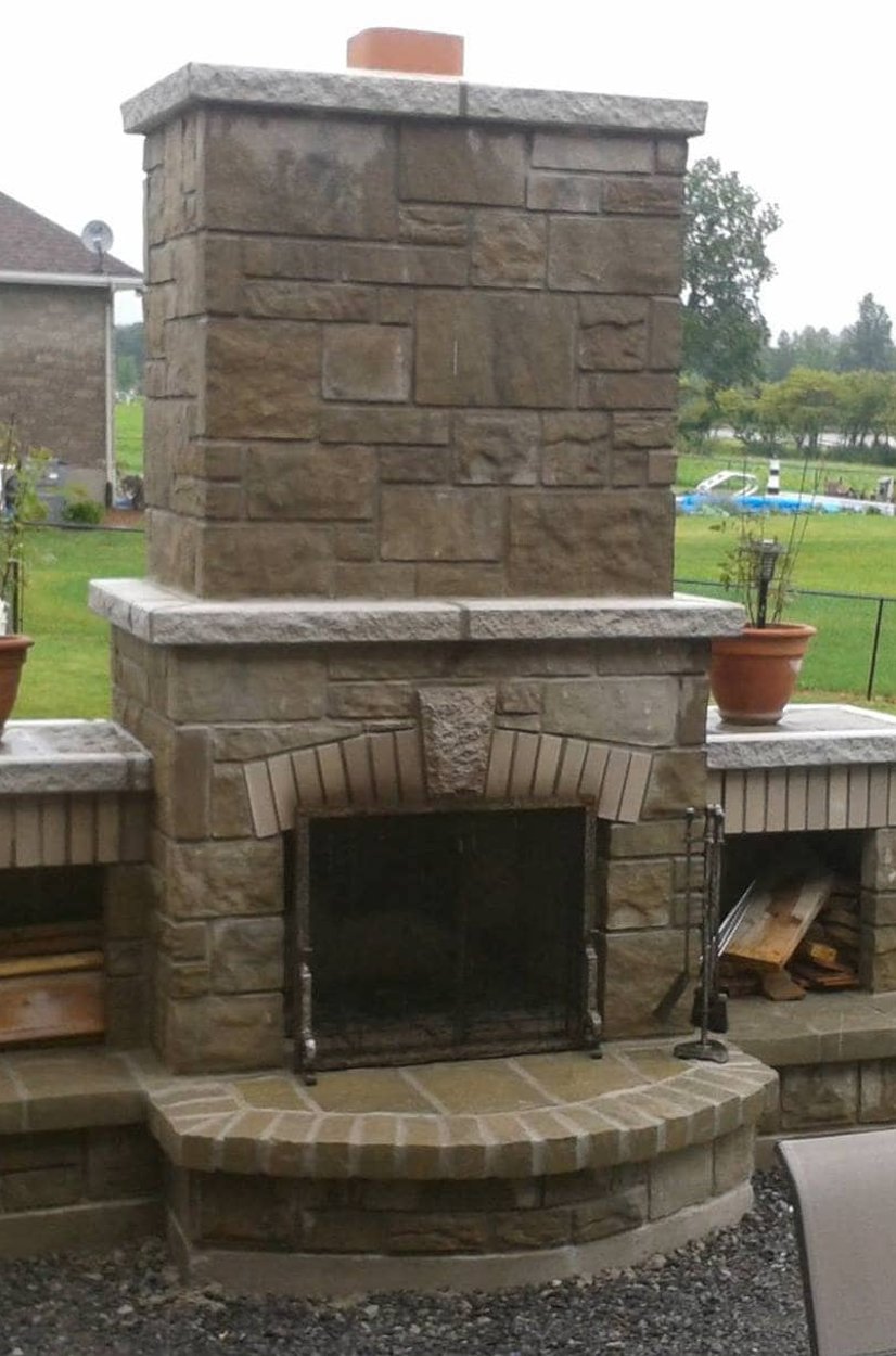 Outdoor stone and firebricked fireplace