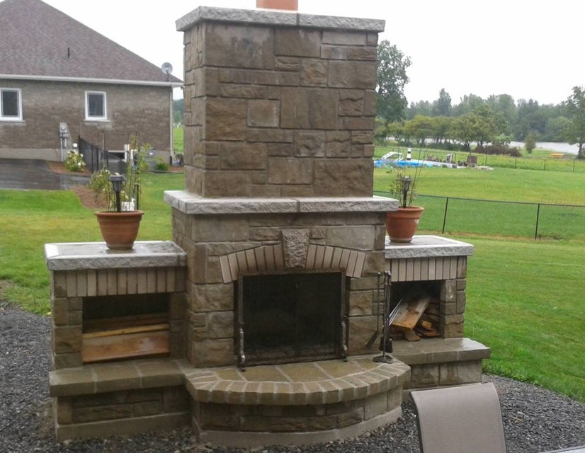 Outdoor stone and firebricked fireplace