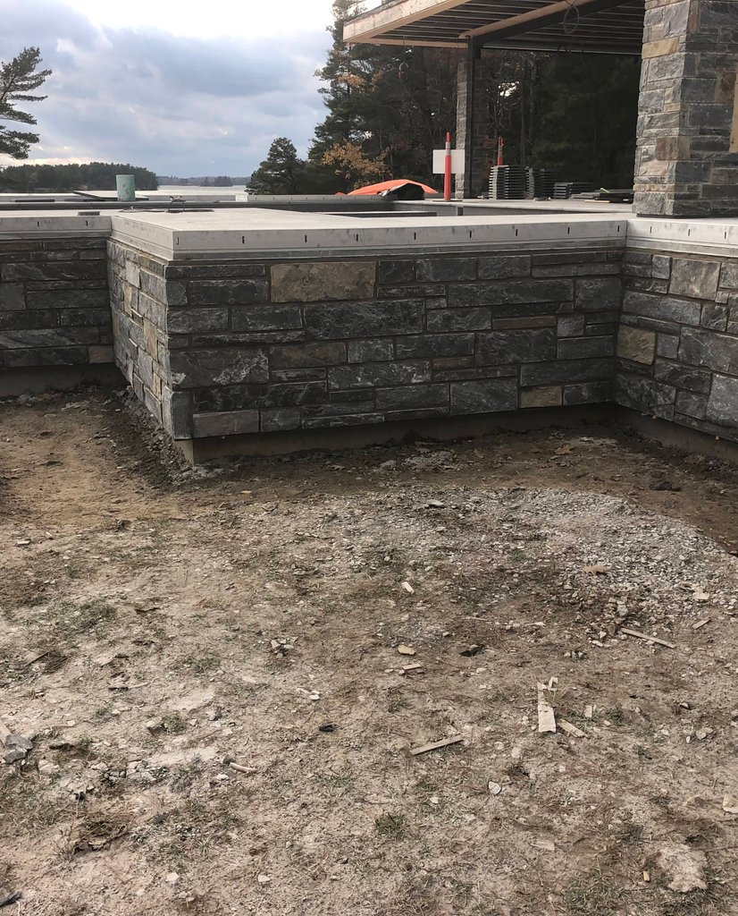natural stone retainer wall at Hill Island